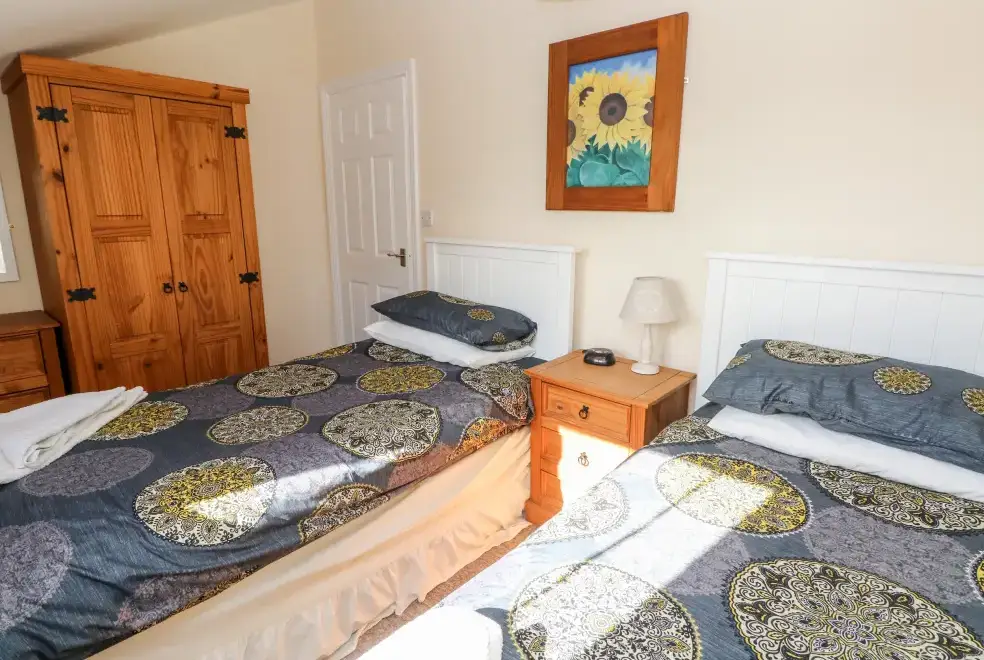 Bedroom at Saddlers Cottage, Berllandeg Farm
