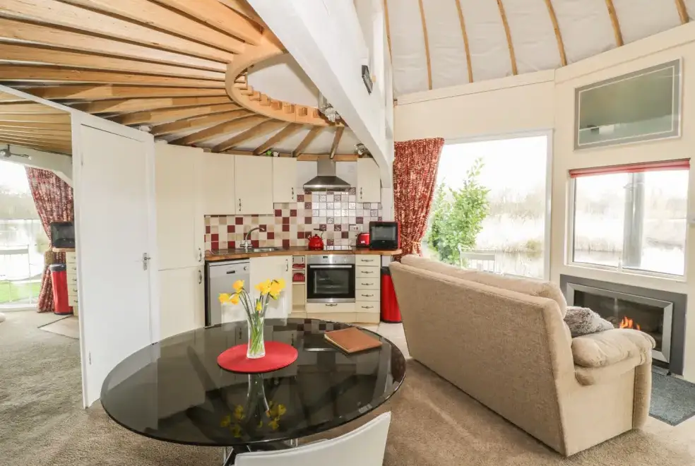 Open plan living area at Secret Island Yurt