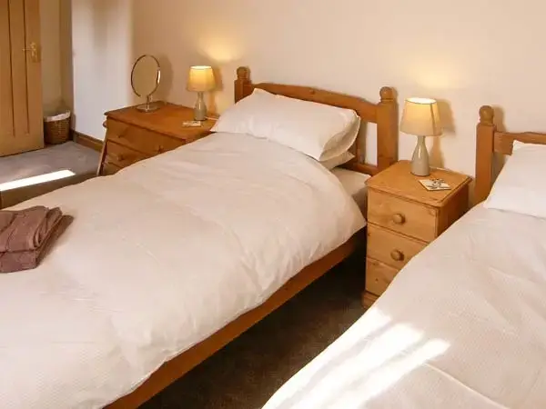 Bedroom at Shepherd's Hut Barn, rural Dorset