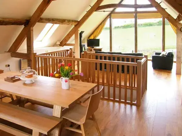 Open plan living area at Shepherd's Hut Barn, rural Dorset