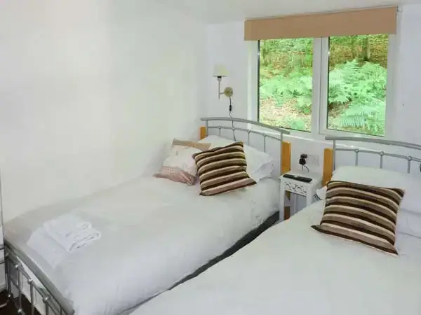 Bedroom at Skiptory Woodland Holiday Lodge
