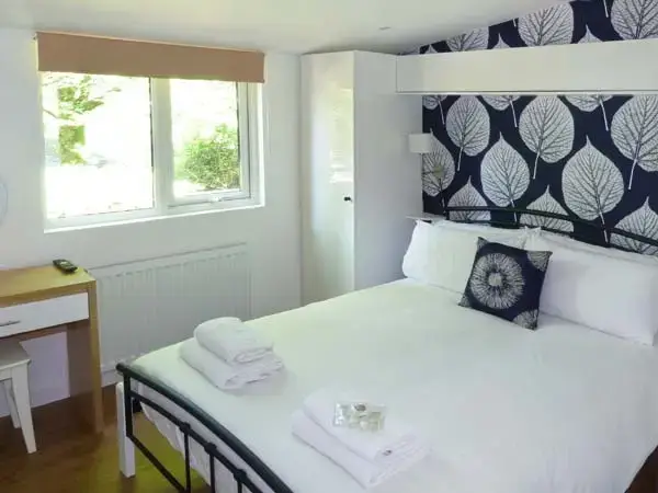 Bedroom at Skiptory Woodland Holiday Lodge