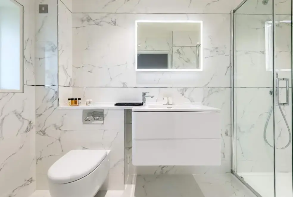 Ensuite bathroom at Sleeps 10, Gold Award Winning House, M1 rated, ideal for all generations with downstairs bedroom and wet room