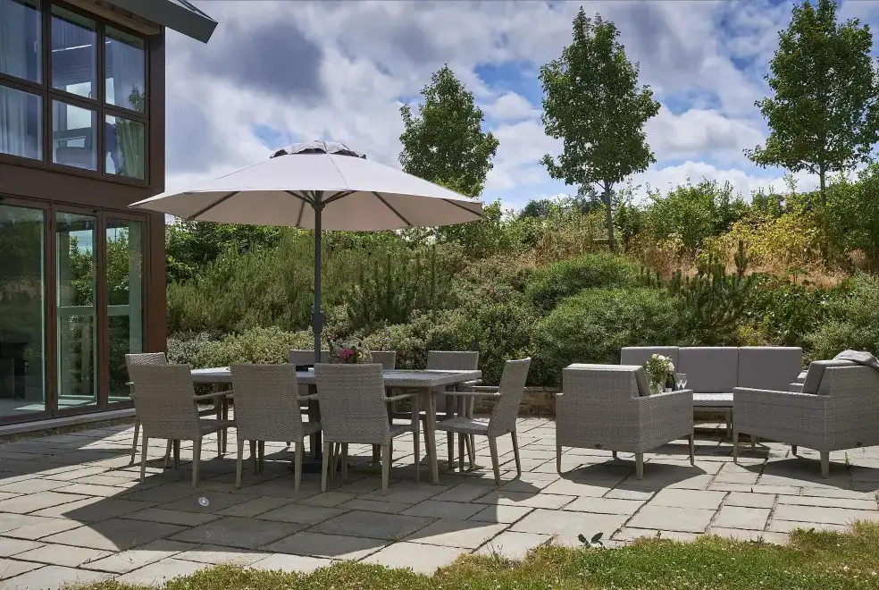 Patio area at Sleeps 10, Gold Award Winning House, M1 rated, ideal for all generations with downstairs bedroom and wet room
