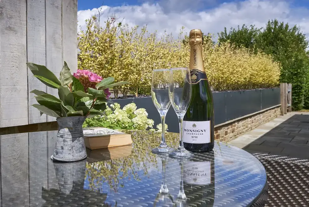 Patio area at Sleeps 2, Romantic, Modern, Luxurious Cottage with garden, WiFi and Amazing Views