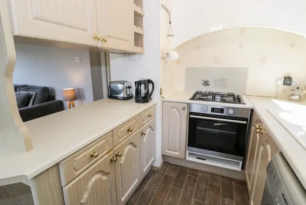 Well equipped kitchen at Springtime Log Cabin