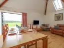 Open plan living area at Swallows Nest - thumbnail photo