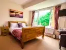 Bedroom at Symonds Yat Lodge - thumbnail photo