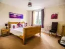 Bedroom at Symonds Yat Lodge - thumbnail photo