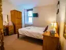 Bedroom at Symonds Yat Lodge - thumbnail photo