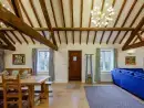 Open plan living area at Teal Cottage at Oxford Country Cottages - thumbnail photo