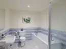 Family bathroom at Teal Cottage at Oxford Country Cottages - thumbnail photo