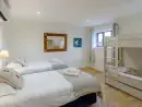 Twin bedroom at Teal Cottage at Oxford Country Cottages - thumbnail photo