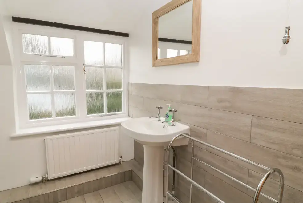 Shower room at Thatchings Thatched Country Cottage