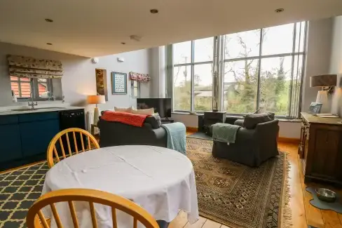 Open plan living area at The Barn at Glanoer, Powys