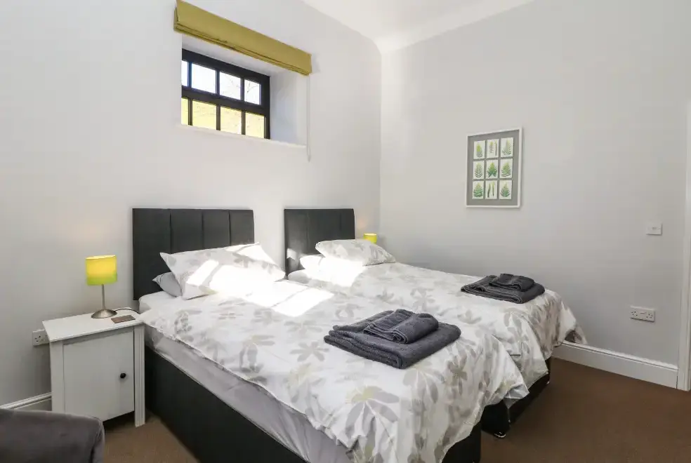 Bedroom at The Barn at Hill House