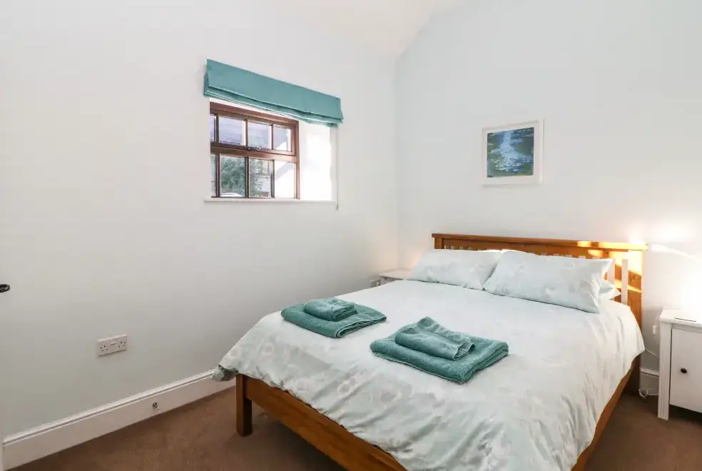 Bedroom at The Barn at Hill House