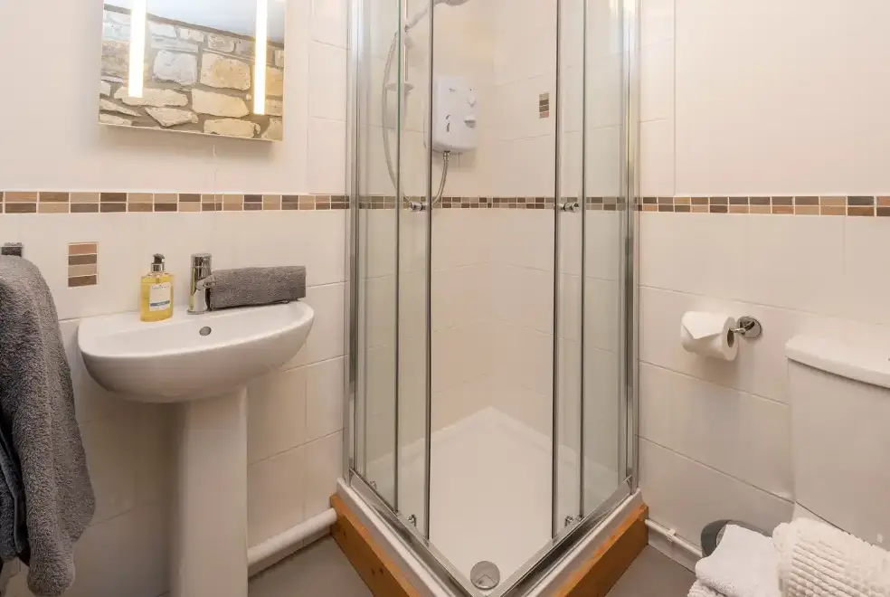 Shower room at The Barn with hot tub