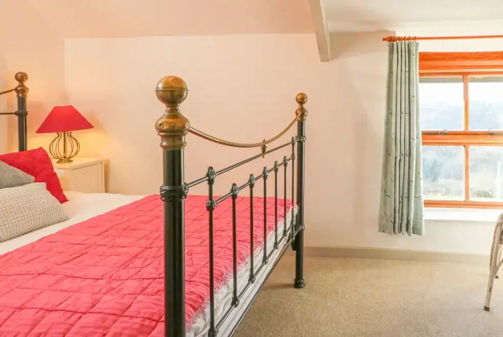 Bedroom at The Byre Coastal Cottage, South West England 