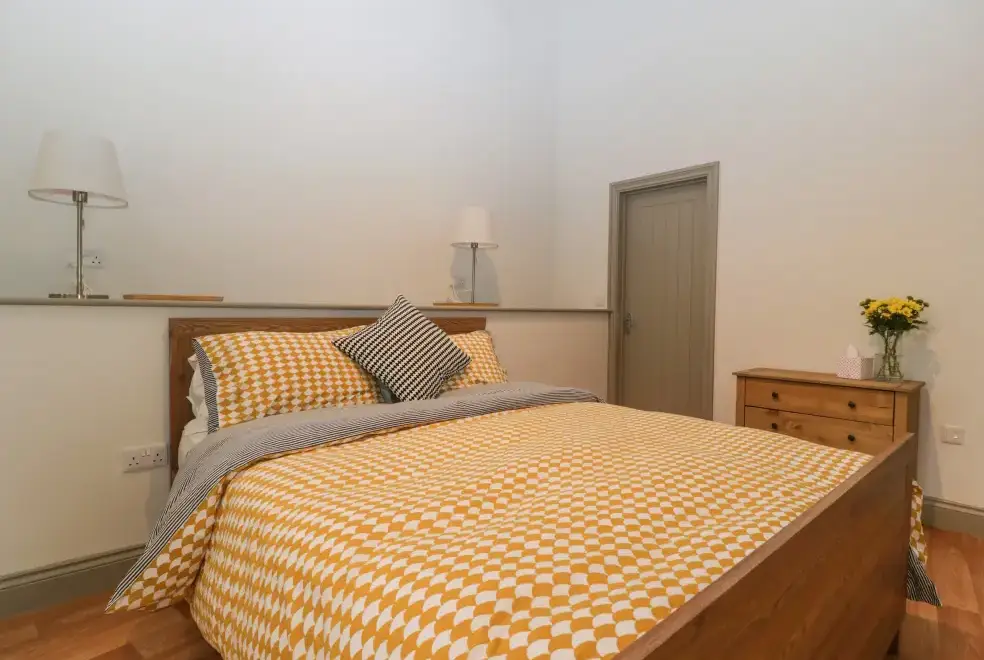 Bedroom at The Coach House Romantic Retreat