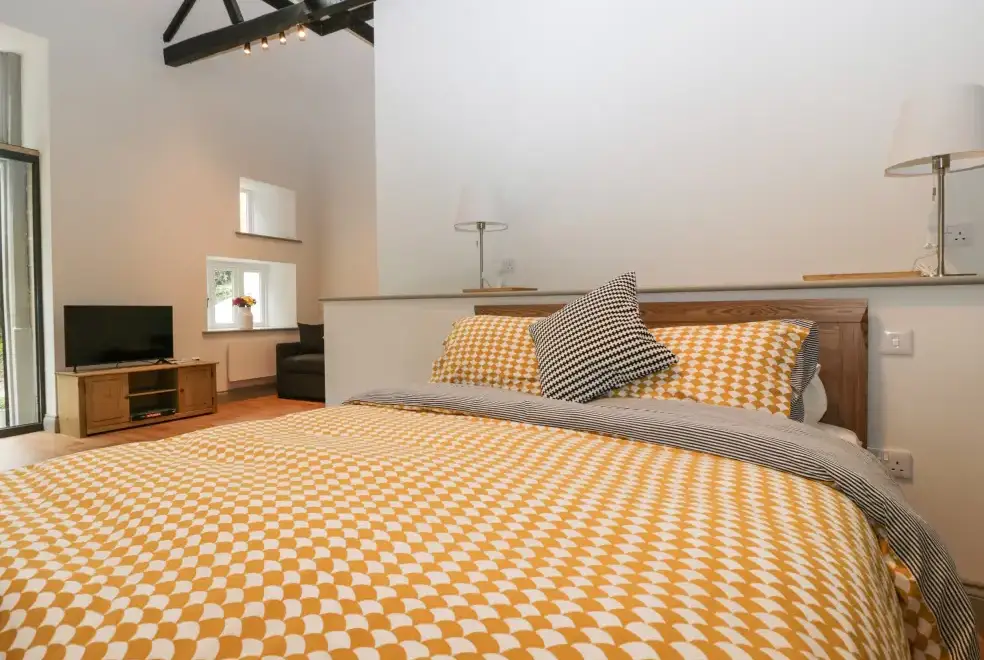 Bedroom at The Coach House Romantic Retreat