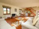 Open plan living area at The Coach House - thumbnail photo