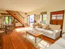 Open plan living area at The Coach House - thumbnail photo