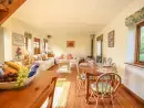 Open plan living area at The Coach House - thumbnail photo