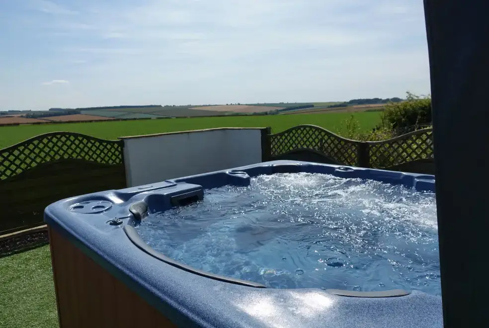 Outdoor hot tub at The Cornmill 