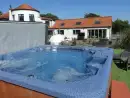 Outdoor hot tub at The Cornmill  - thumbnail photo