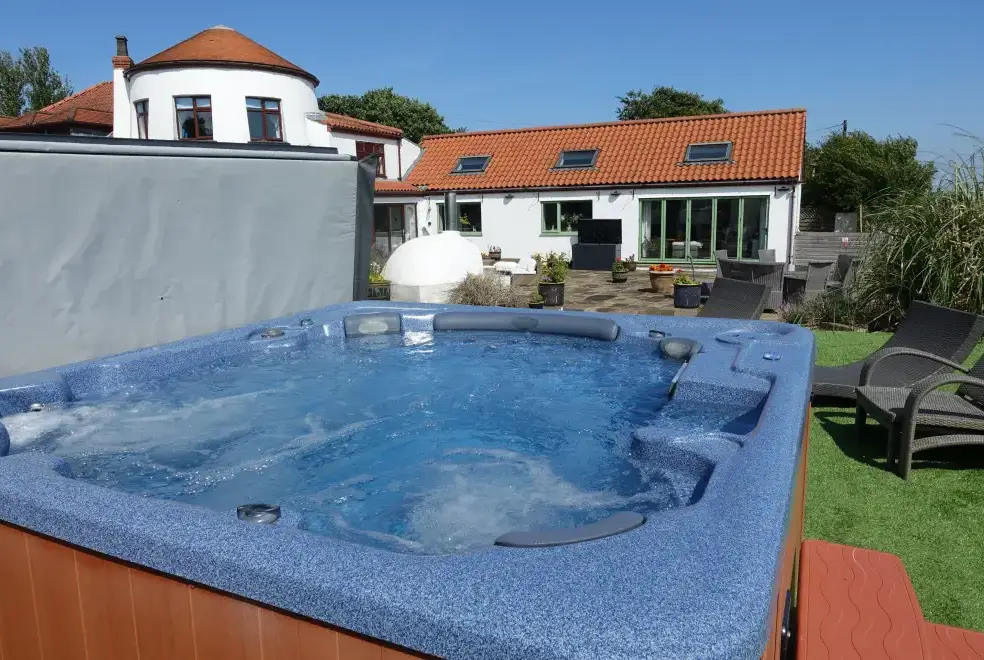 Outdoor hot tub at The Cornmill 