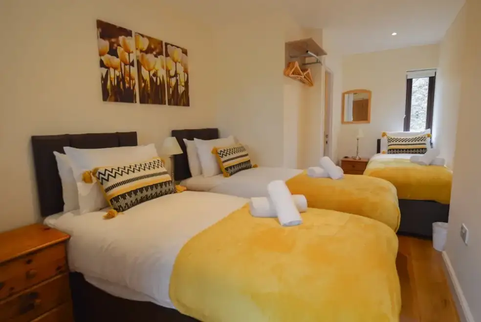 Bedroom at The Cotswold Manor Court with Hot Tub