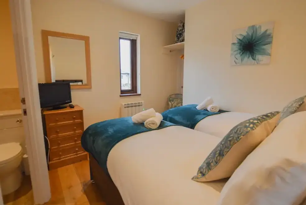 Bedroom at The Cotswold Manor Court with Hot Tub