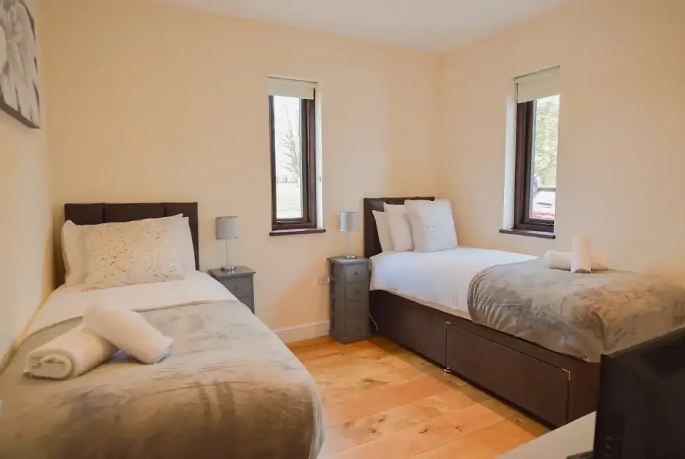 Bedroom at The Cotswold Manor Court with Hot Tub