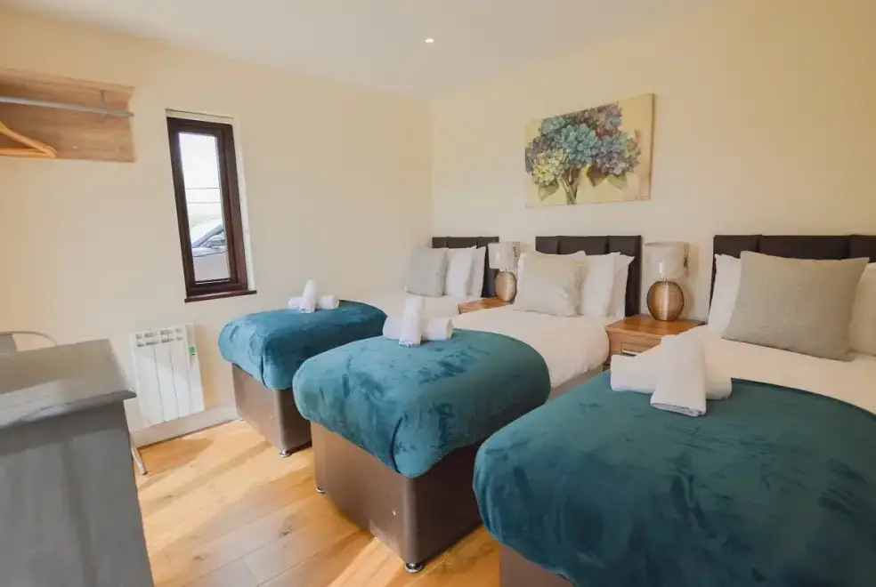 Bedroom at The Cotswold Manor Court with Hot Tub