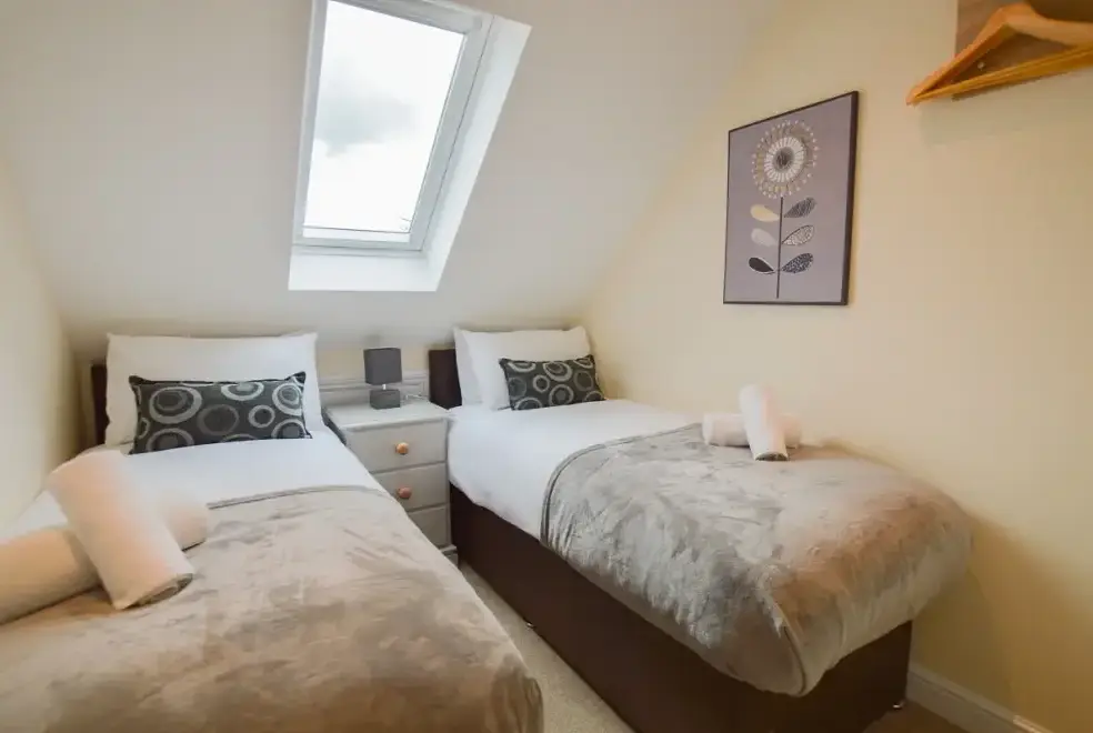 Bedroom at The Cotswold Manor Court with Hot Tub