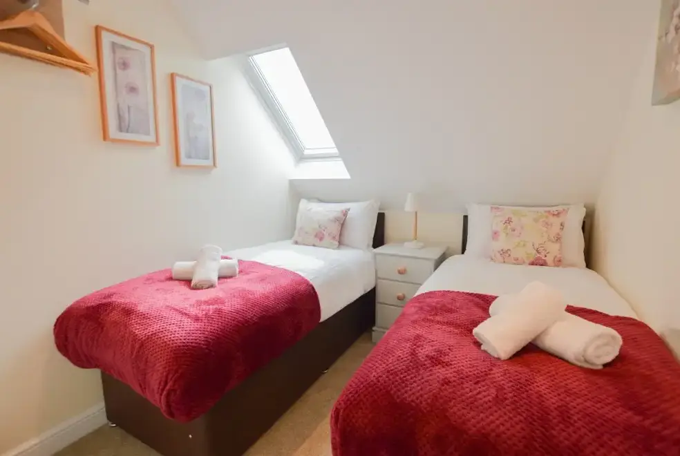 Bedroom at The Cotswold Manor Court with Hot Tub