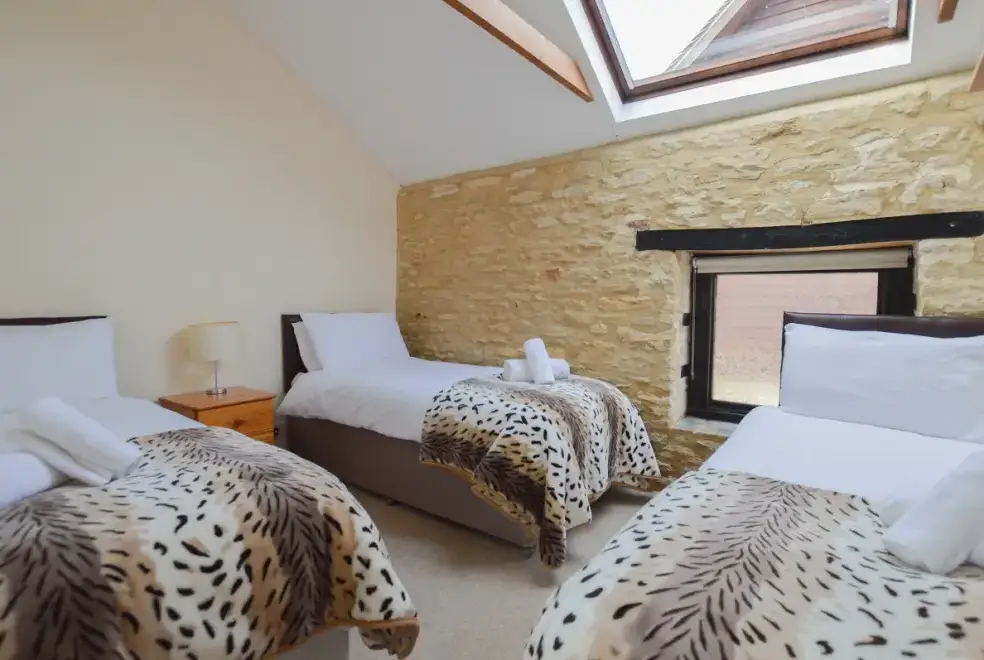 Children's bedroom at The Cotswold Manor Grange, Exclusive Hot-Tub, Games Barn, 70 acres of Parkland