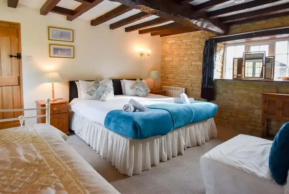 Bedroom at The Cotswold Manor Hall