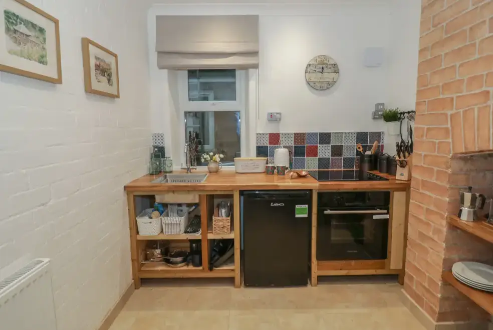 Well equipped kitchen at The Escape Romantic Retreat