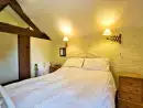 Bedroom at The Granary at Old Barn Cottages - thumbnail photo