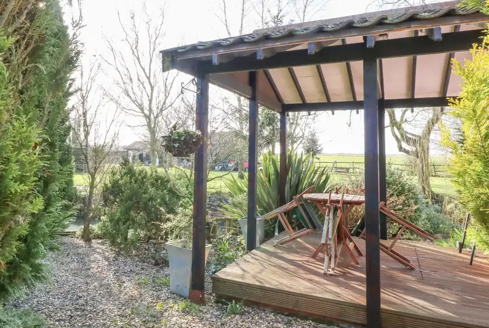 Decked area at The Haybarn Pet-Friendly Country Cottage, Near Swaffham, East Anglia