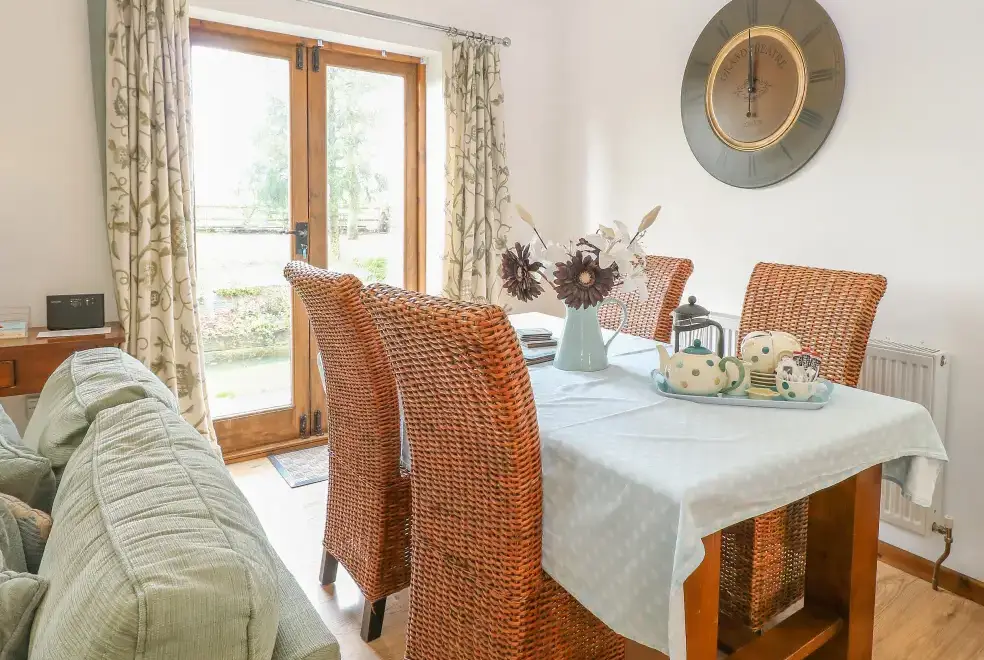 Dining room at The Haybarn Pet-Friendly Country Cottage, Near Swaffham, East Anglia