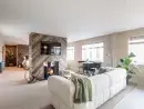Open plan living area at The Hayloft - thumbnail photo