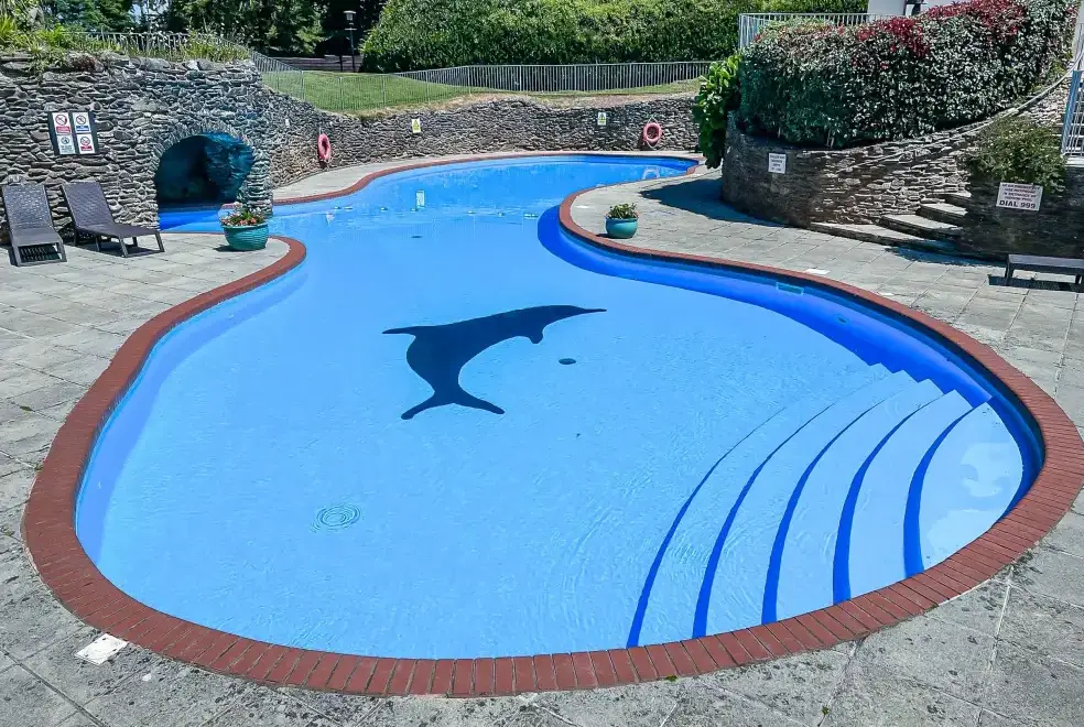Outdoor swimming pool at The Lawns Luxury Apartment in Devon/Beautiful South Hams