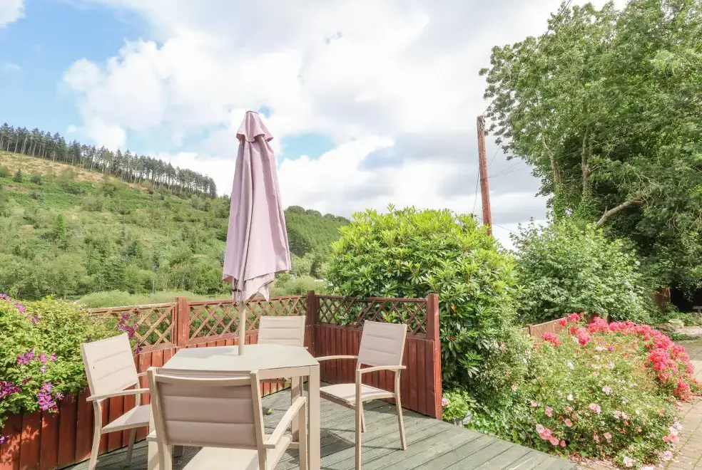 Decked area at The Little White Cottage, North Wales 
