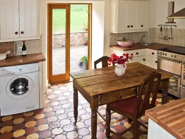 Kitchen/diner at The Lodge Farm Barn, Heart Of England