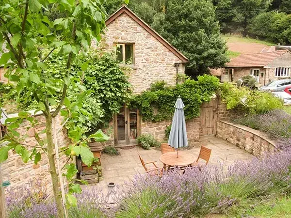 Patio area at The Lodge Farm Barn, Heart Of England