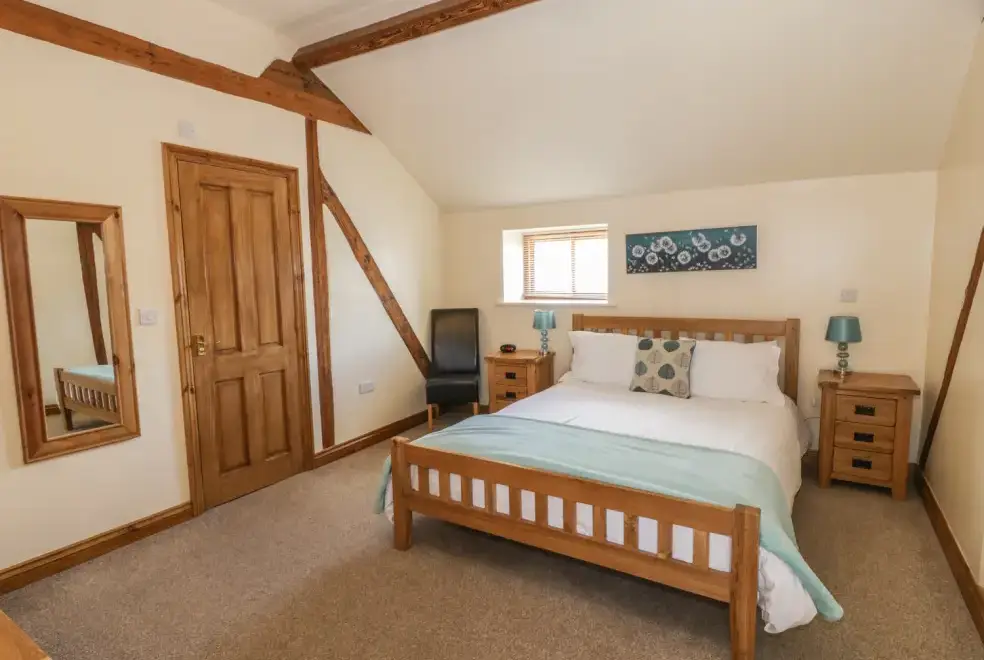 Bedroom at The Mill Farm Cottage near Shrewsbury