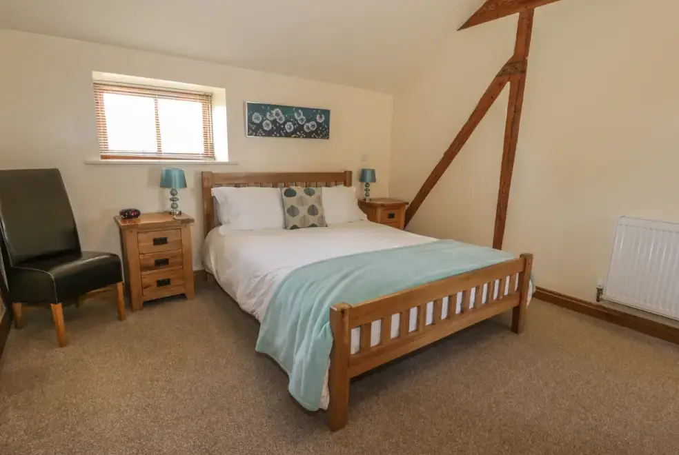 Bedroom at The Mill Farm Cottage near Shrewsbury